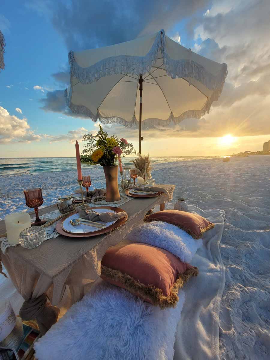 Tides and Tassels Party planning beach romantic dinner setup Tides and Tassels Party planning beach romantic dinner setup